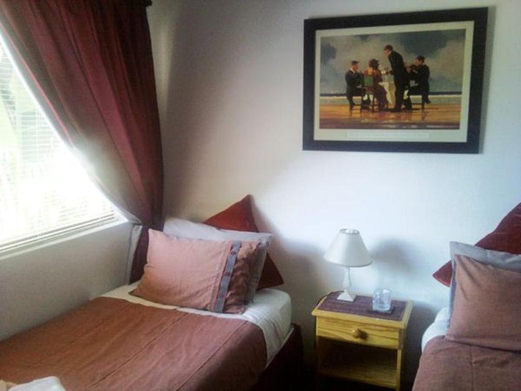 סטלנבוש Magnolia Place Guest Houses חדר תמונה