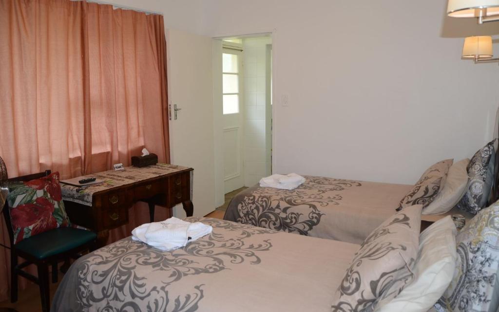 סטלנבוש Magnolia Place Guest Houses חדר תמונה